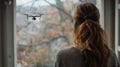 Lady Seeing A UAV Unmanned Aircraft Drone Flying Just Outside The Window of Her House