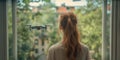 Woman Seeing A UAV Unmanned Aircraft Drone Flying Just Outside The Window of Her House