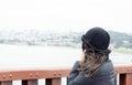 woman seen from behind while looking at the panorama of the San Francisco Bay from the Golden Gate Bridge Royalty Free Stock Photo