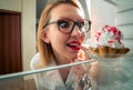 Woman sees the sweet cake Royalty Free Stock Photo