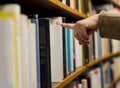 Woman selecting a book