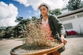 Woman selecting coffee beans.