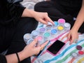 woman selecting the paint sample with which she is going to characterize