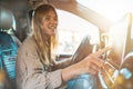 Woman selects the destination with car gps navigator Royalty Free Stock Photo