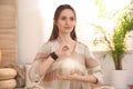 Woman during self-healing session in therapy room Royalty Free Stock Photo