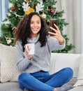 Woman, selfie and Christmas holiday in home with coffee drink as social media post, tree or connection. Female person Royalty Free Stock Photo