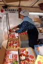 Woman selling apples