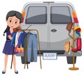 Woman selling clothes at yard sale Royalty Free Stock Photo