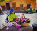 Woman Selling Dolls on Street, Mexico