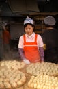 Woman selling dumpling at the market in Korea