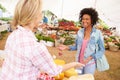 Woman Selling Fresh Cheese At Farmers Food Market Royalty Free Stock Photo