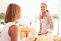 Woman Selling Fresh Cheese At Farmers Food Market Royalty Free Stock Photo