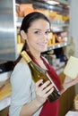 Woman selling fresh cheese at farmers food market Royalty Free Stock Photo