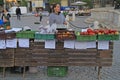 Woman is selling fruits on the street market in Brno, Czech