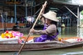 Woman selling Garlands in Damnoen Saduak