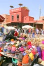 Woman selling hats in market