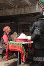 Woman selling kashk in Osh