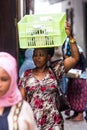 Woman selling lunch boxes in Zanzibar Royalty Free Stock Photo