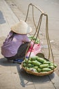 Woman selling mangos