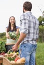 Woman selling organic vegetables at market Royalty Free Stock Photo