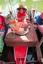 Woman selling seafood sticks at Klong Hae floating market, Hatyai, Thailand Royalty Free Stock Photo