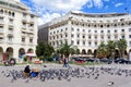 Woman selling seeds for feeding the pigeons in Famous square Aristotelous in Thessaloniki, Greece. Thessaloniki is the second