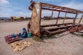 Woman selling souvenirs at train cemetery in Bolivia