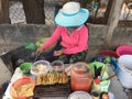 A woman selling street foods in Dalat, Lam Dong, Vietnam Royalty Free Stock Photo