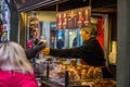 A woman selling traditional czech food `trdlo`