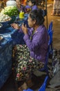 Woman selling vegetables