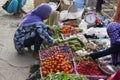 Woman is selling vegetables at a street market in Labuanbajo Royalty Free Stock Photo