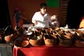 Woman sells homemade traditional food