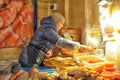 Woman sells red caviar on the market