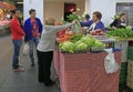 Woman sells vegetables in city Bilbao, Spain Royalty Free Stock Photo