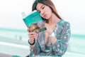 Woman with Sensuality is reading a book on a beach for relaxation concept Royalty Free Stock Photo