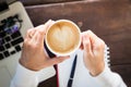 Woman serve the internet at coffee shop