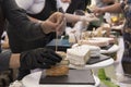 Woman Serving Fresh Cheese At Farmers Food Market Royalty Free Stock Photo