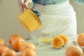 Woman serving squeezed juice