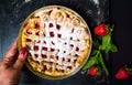 Woman serving strawberry sweet pie pastry dessert