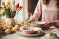 woman setting table for Easter dinner . ai generated Royalty Free Stock Photo