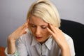 Woman with severe Headache (Migraine)