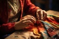 Woman sewing. Female tailor hands with needle