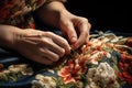 Woman sewing. Female tailor hands with needle