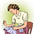 Woman sews shirt thread housewife housework