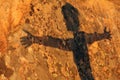 Woman shadow on granite wall