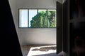 Woman shadow and view through a window from villa Noailles, Hyeres