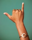 Woman, Shaka sign and hand in studio for surfer greeting, sign language and freedom. Emoji, icon and symbol of a female