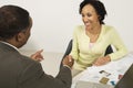 Woman Shaking Hands With Financial Advisor Royalty Free Stock Photo