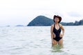 Woman shape huge show prettyl with black bikini on beach Royalty Free Stock Photo