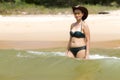 Woman shape enjoy with bikini hat and wave